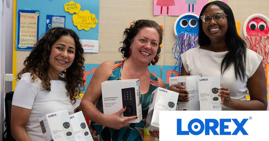 Bryan’s Place staff members and Lorex Director of Marketing Chantelle Meiboom (right) smiling and holding donated Lorex security devices to support facility safety.