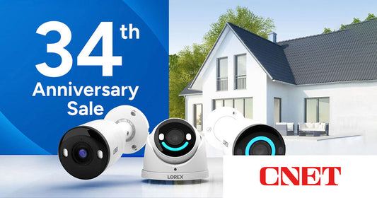 Lorex 34th Anniversary Sale banner featuring three Lorex security cameras in front of a modern house, promoting discounts on home security systems.