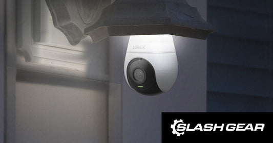 Lorex lightbulb security camera mounted in an outdoor fixture at night, softly lit and featured in SlashGear’s article “13 Benefits of Smart Home Automation (and Why It's Worth the Hassle of Setting It Up).