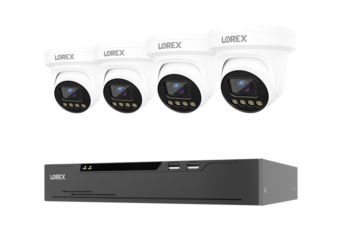 A set of four white dome security cameras with black lenses arranged above a black NVR recording device on a plain white background. The brand LOREX is visible on both the cameras and the NVR.