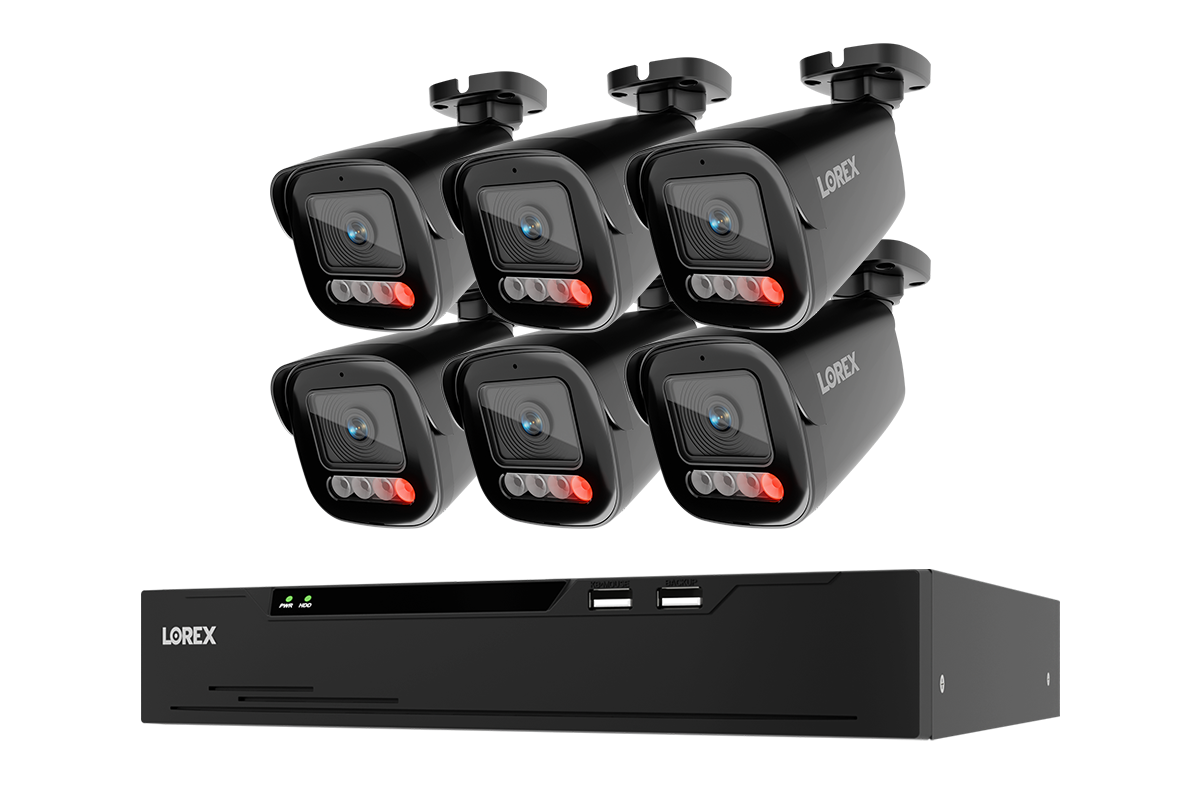 A 6-camera security camera kit with a black NVR recorder, shown on a solid white background. The cameras feature red LED indicator lights and the brand name 'LOREX' is visible on both the cameras and the NVR.