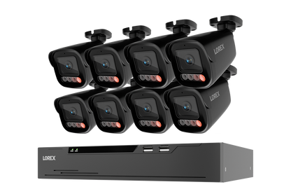 A 8-channel security camera surveillance kit by LOREX, featuring eight black bullet cameras arranged in two rows above a matching black NVR receiver box, isolated on a white background.