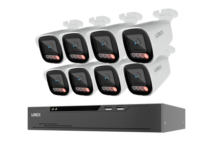 A 8-camera security video surveillance kit by LOREX, featuring eight white bullet cameras with black lenses and red indicator lights, paired with a black 8-channel NVR recorder, shown on a solid white background.