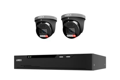A Lorex security camera kit featuring two turret cameras with red IR LEDs and a black NVR receiver box, shown against a plain white background.