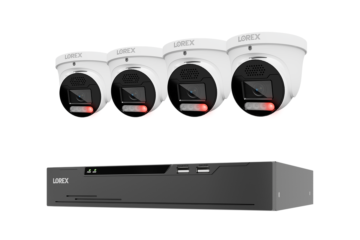 A set of four white turret security cameras with black lenses and red indicator lights, shown above a black LOREX NVR recorder on a plain white background.