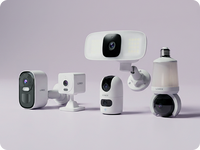 Lorex smart home security cameras including battery, indoor, floodlight, lightbulb and plug-in cameras displayed on a light purple background