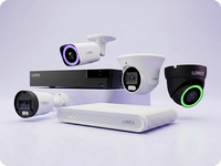 Lorex security cameras and recorders displayed together, featuring wired bullet, turret, dome and indoor cameras for complete security systems