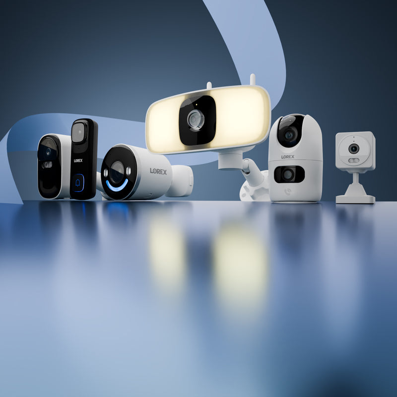 Lorex wireless security cameras including video doorbell, floodlight camera, indoor Wi-Fi camera, and outdoor camera on a blue background